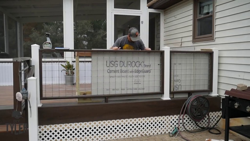 inserting concrete board behind outdoor kitchen frame