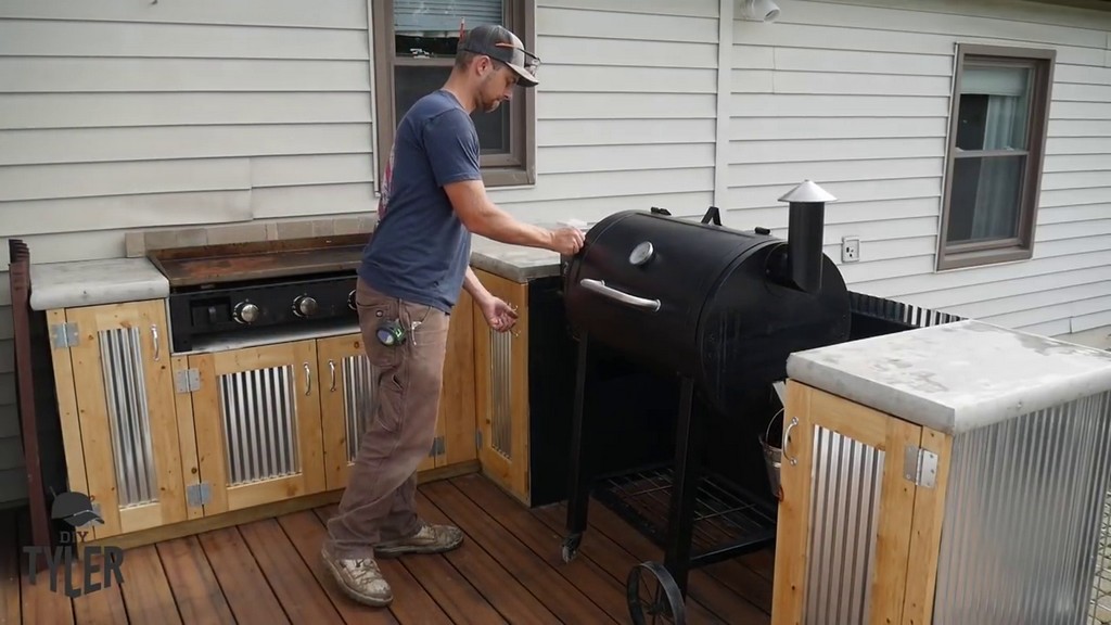 installing pellet grill into outdoor kitchen