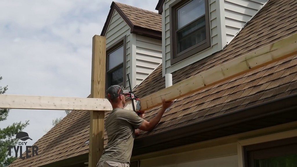 installing doubleheader for free standing deck roof