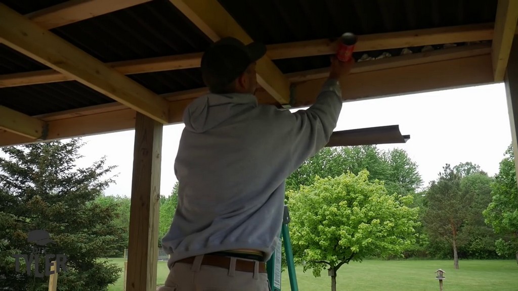 sealing edges of covered deck roof with foam