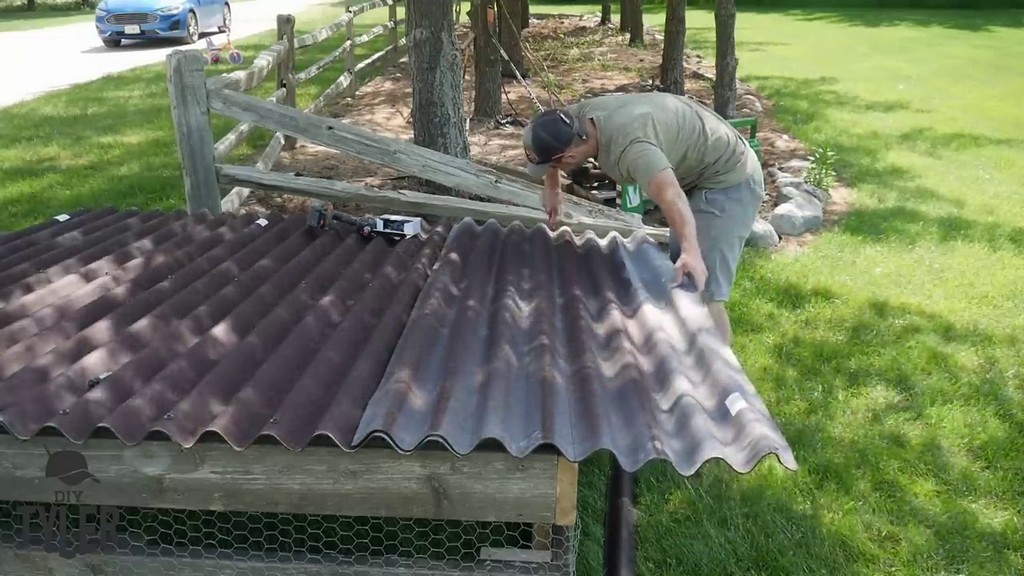 installing roofing panels to DIY chicken tractor roof