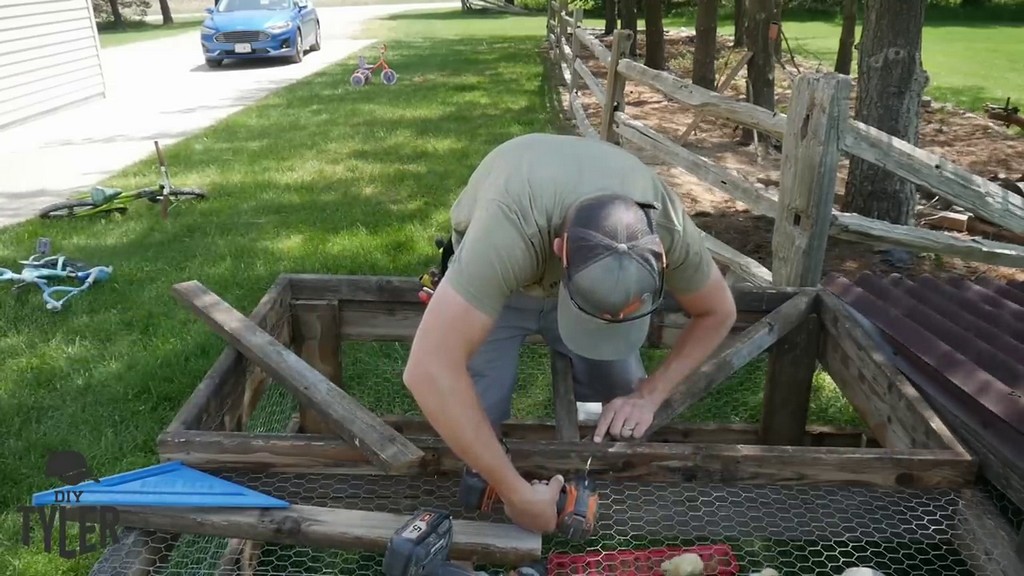 drilling boards for DIY chicken tractor door frame