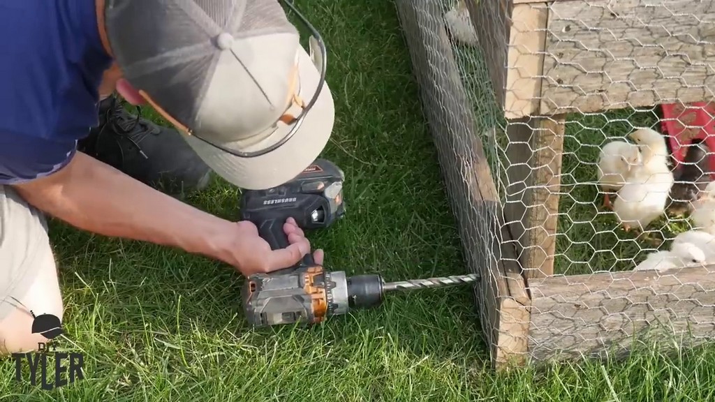 drilling holes in DIY chicken tractor frame for eye bolts