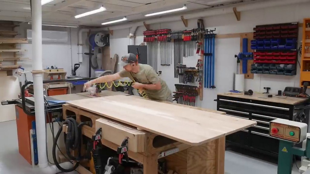 cleaning dust off kitchen tabletop with compressed air