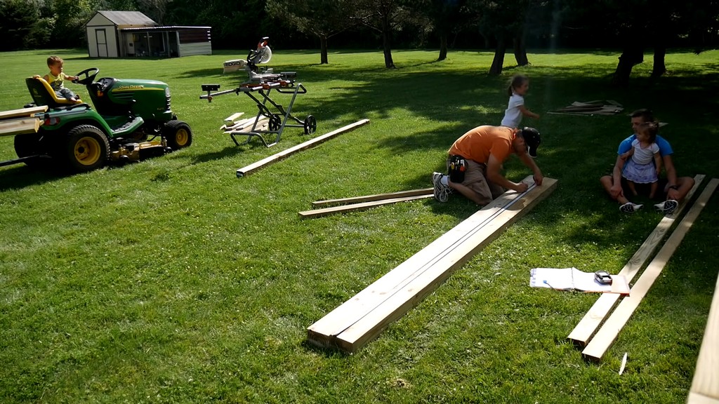 measuring and marking pilot holes for monkey bars