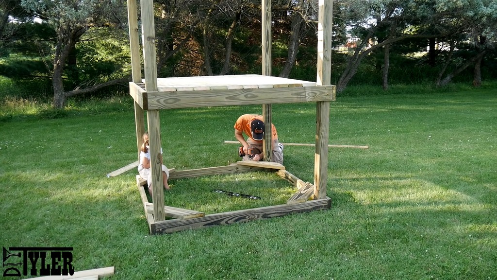 installing frame supports for diy backyard swing set tower