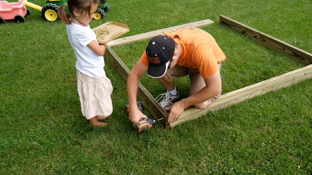 drilling corners of base frame for diy backyard swing set