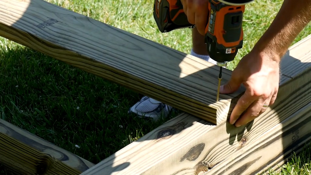 drilling joists for diy backyard swing set