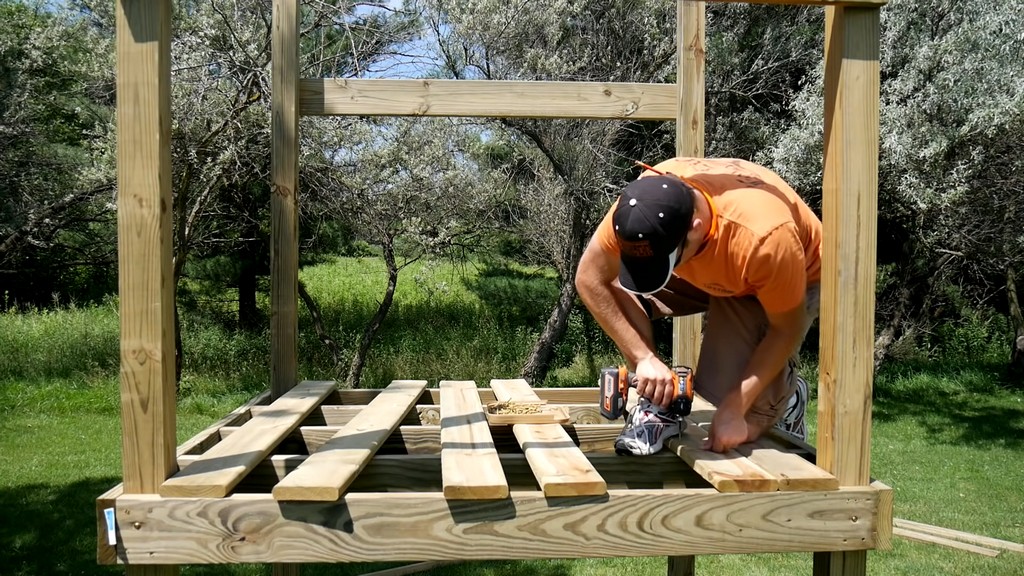 installing floor boards for diy backyard swing set