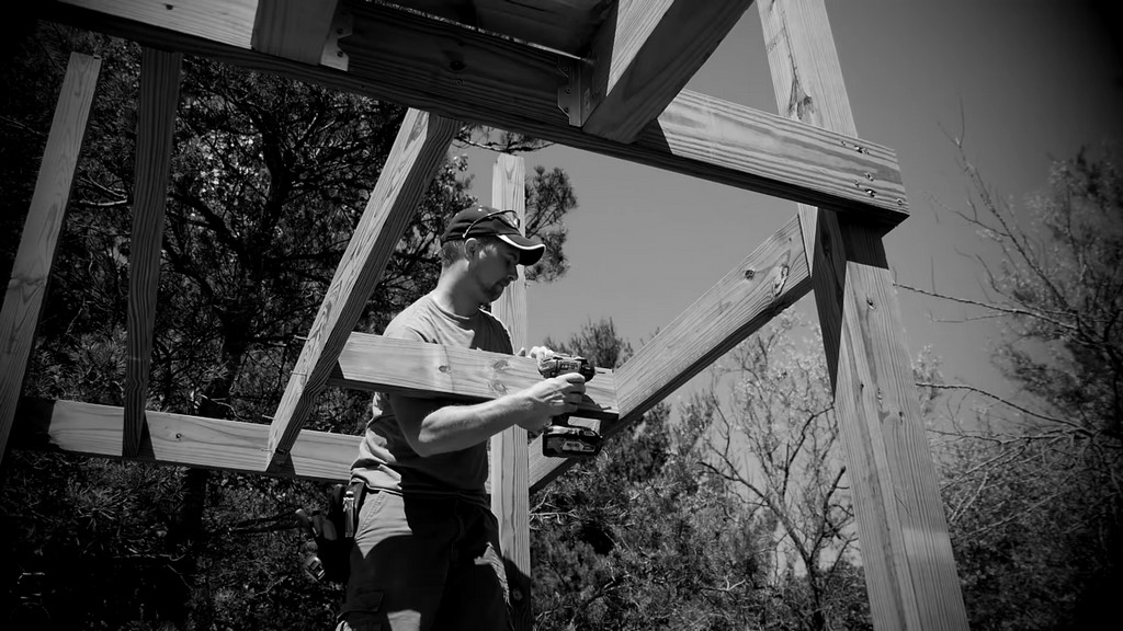 installing joists for DIY swing set