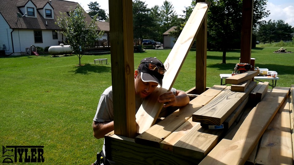 lining board up to post to measure notch