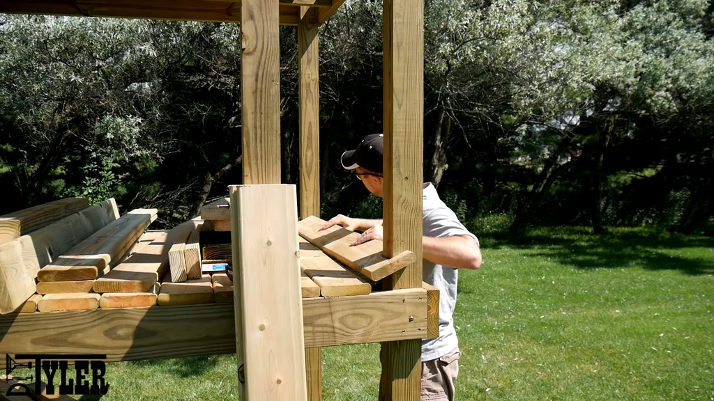 installing notched decking board to diy swing set