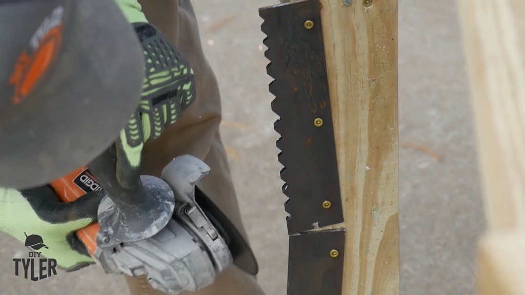 cutting out teeth into metal with angle grinder