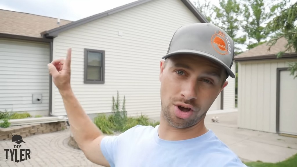 man standing in front of diy home addition