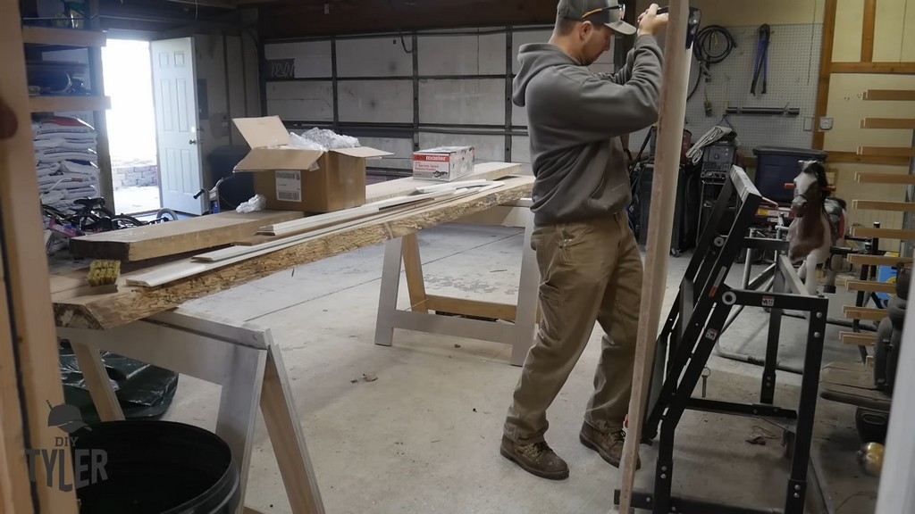 man loading panel onto ROCKLER Material Mate cart