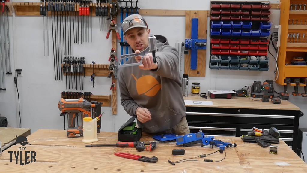 man holding up iGaging depth gauge