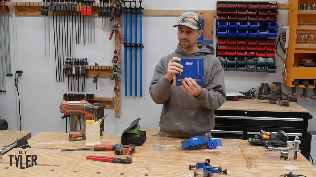 man holding up KREG cabinet jig