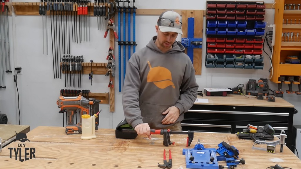 man demonstrating large BESSEY clamp