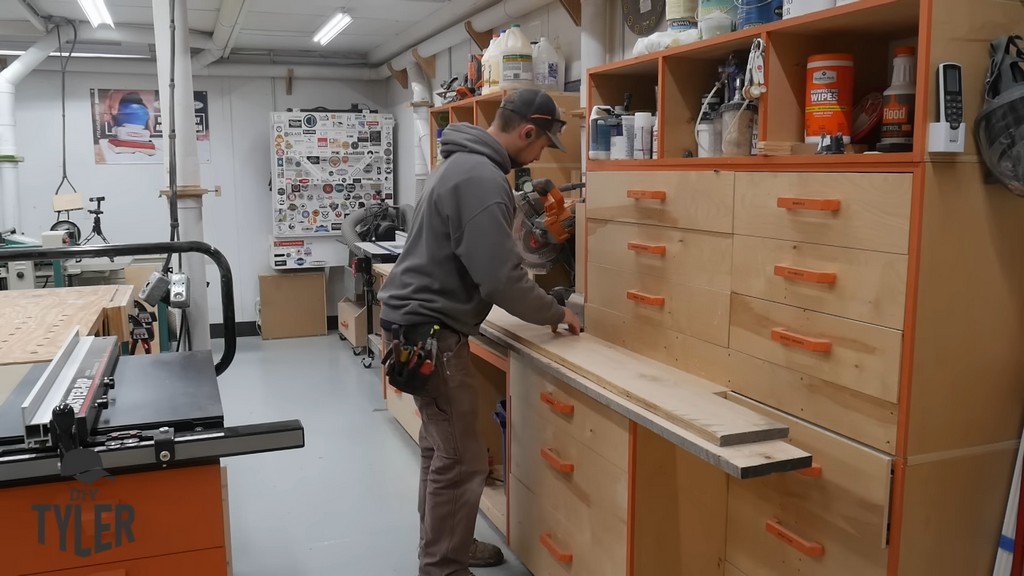 man preparing ash wood boards for cutting