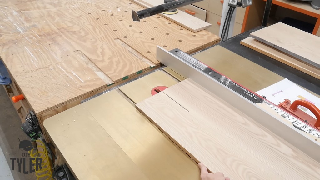 ash wood board being run through Harvey Alpha table saw