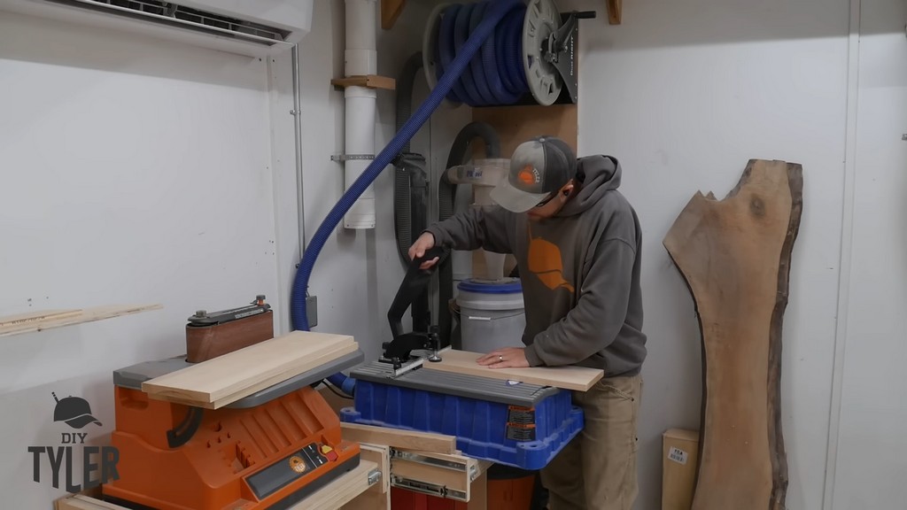 man adding pocket holes to box piece for diy functional bathroom shelf