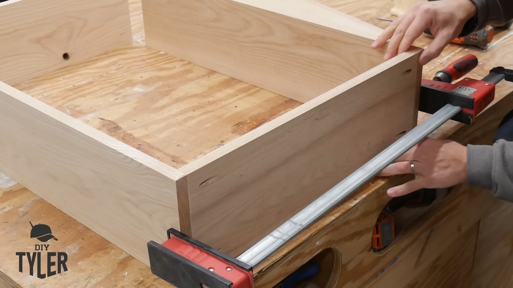 man clamping box frame for DIY functional bathroom shelf
