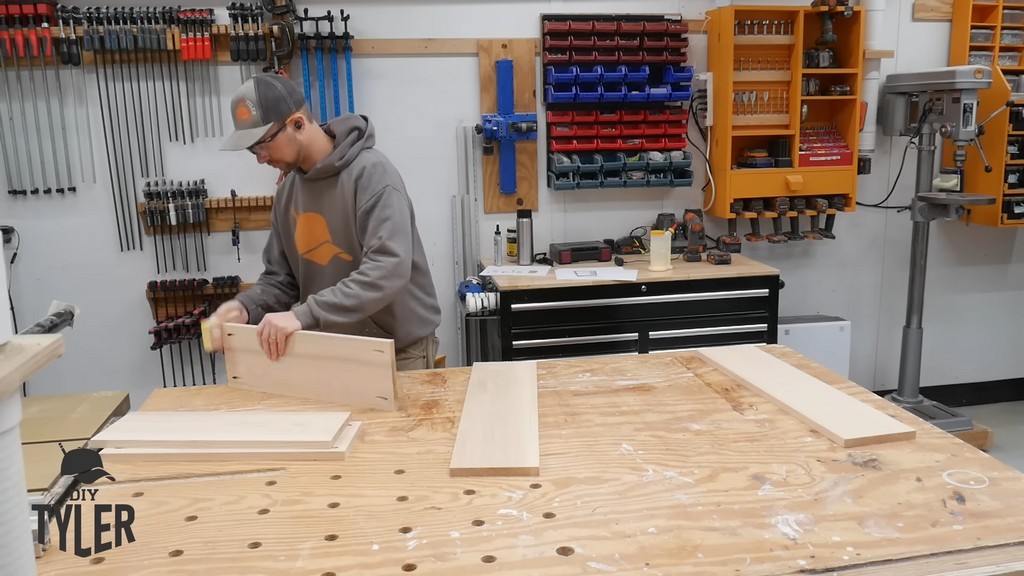 man prepping board with offset pocket holes