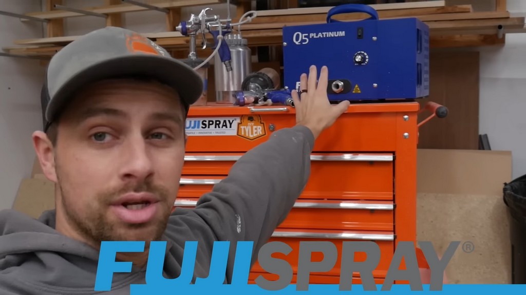 man gesturing to Fuji Spray paint spraying kit set