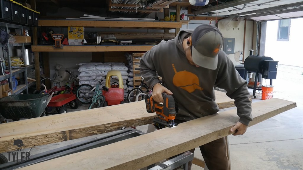 man cutting hickory slab with jigsaw