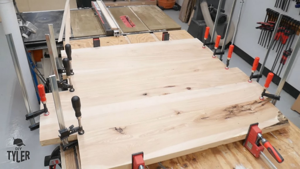 hickory boards glued and clamped into slab shape for DIY round coffee table