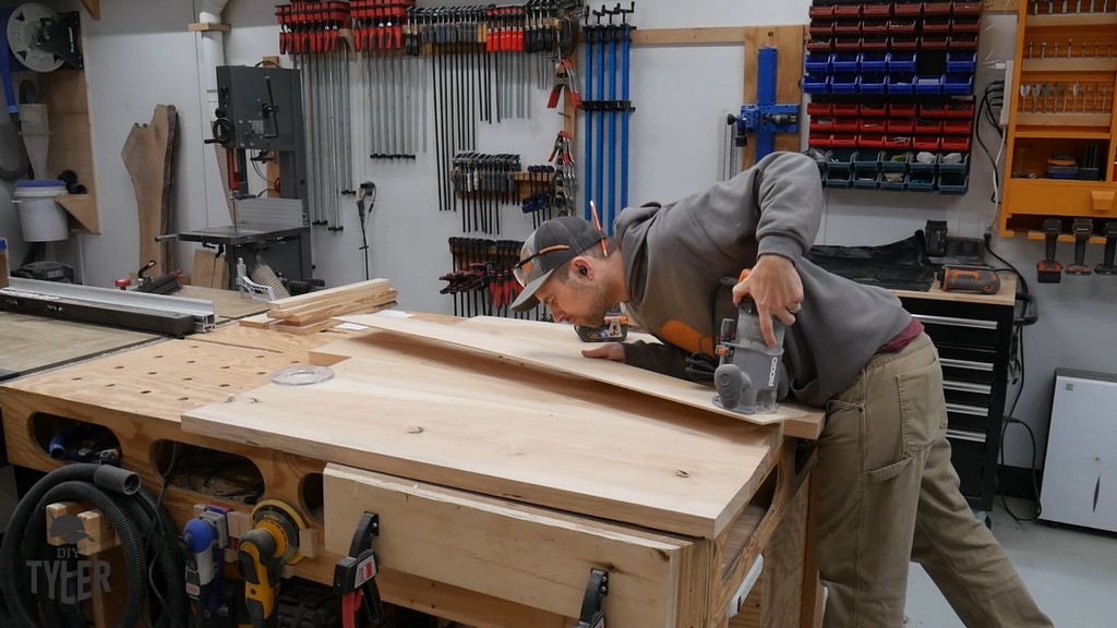 man inspecting hole for drilling makeshift radius jig into place