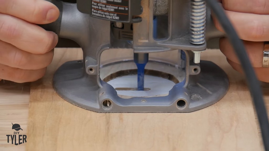 man making initial cut into hickory slab using router and straight bit