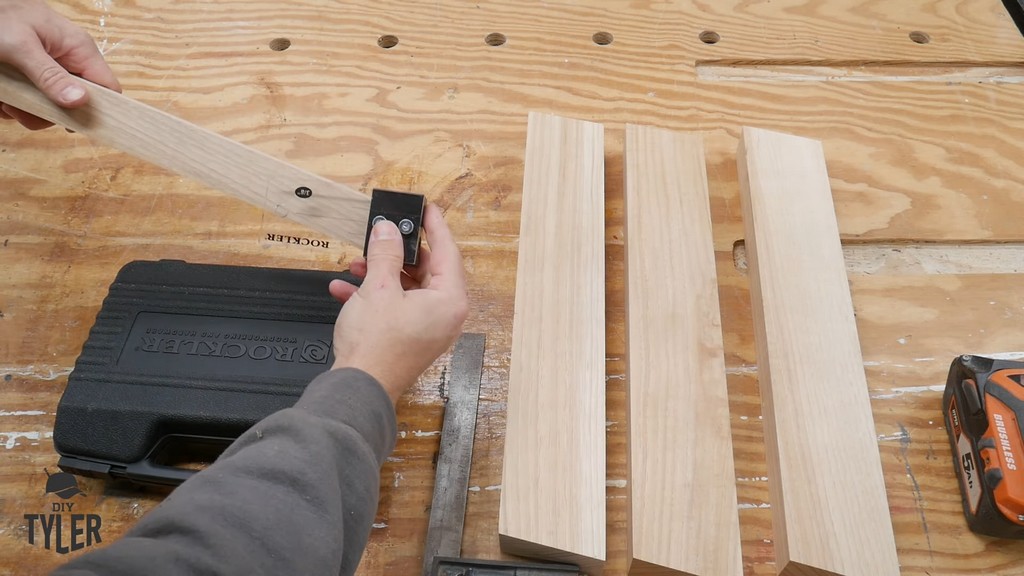 man demonstrating angled table legs and Rockler dowel guide jig