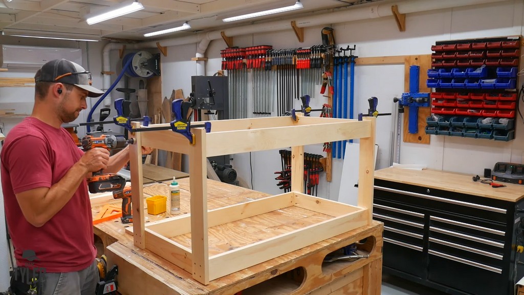 man fastening table legs into place