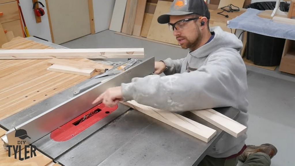 man demonstrating gap for table saw fence