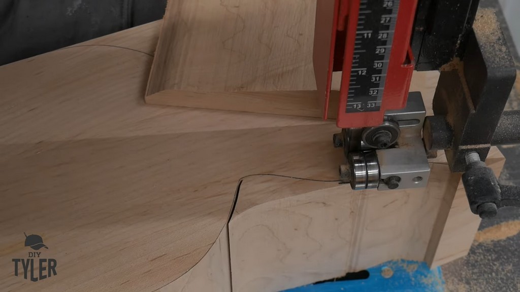 man running hard maple wood through bandsaw