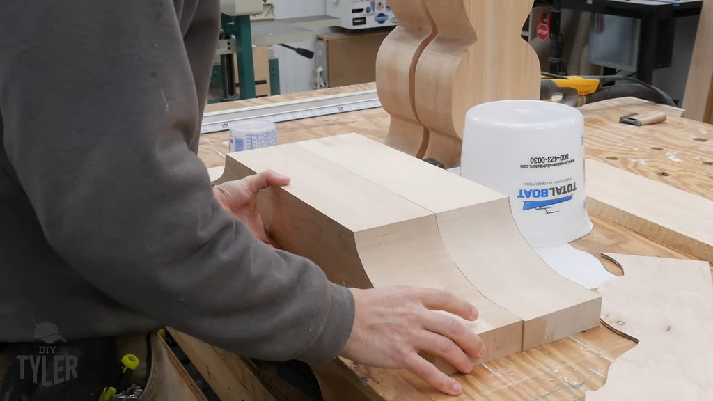 man matching up pedestal base pieces