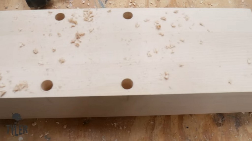 set of dowel holes drilled into pedestal base piece