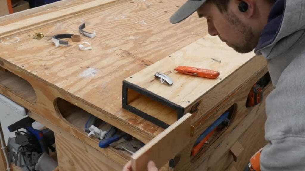 man testing door for steam box